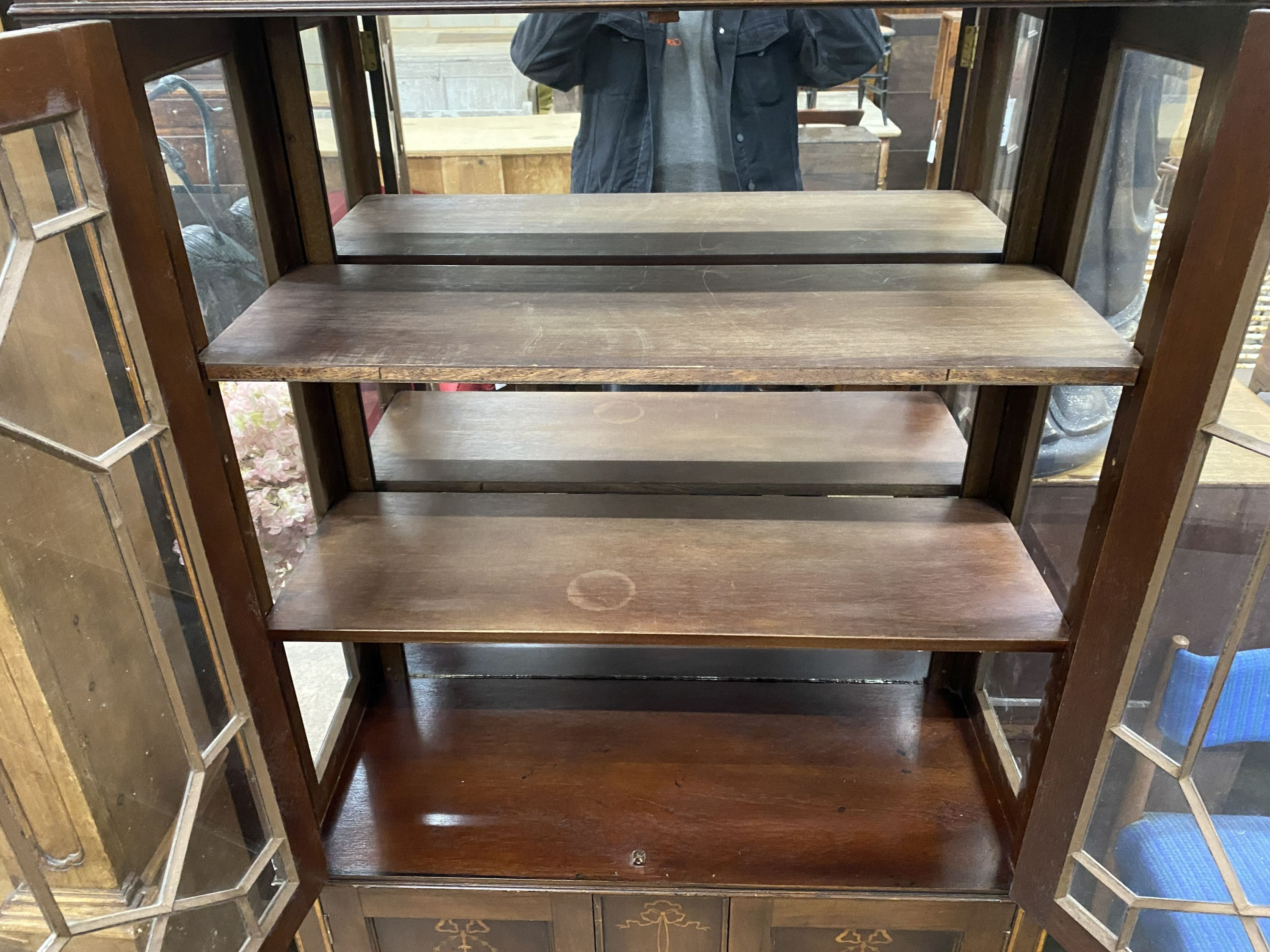 An Edwardian marquetry inlaid mahogany display cabinet, width 94cm, depth 38cm, height 174cm